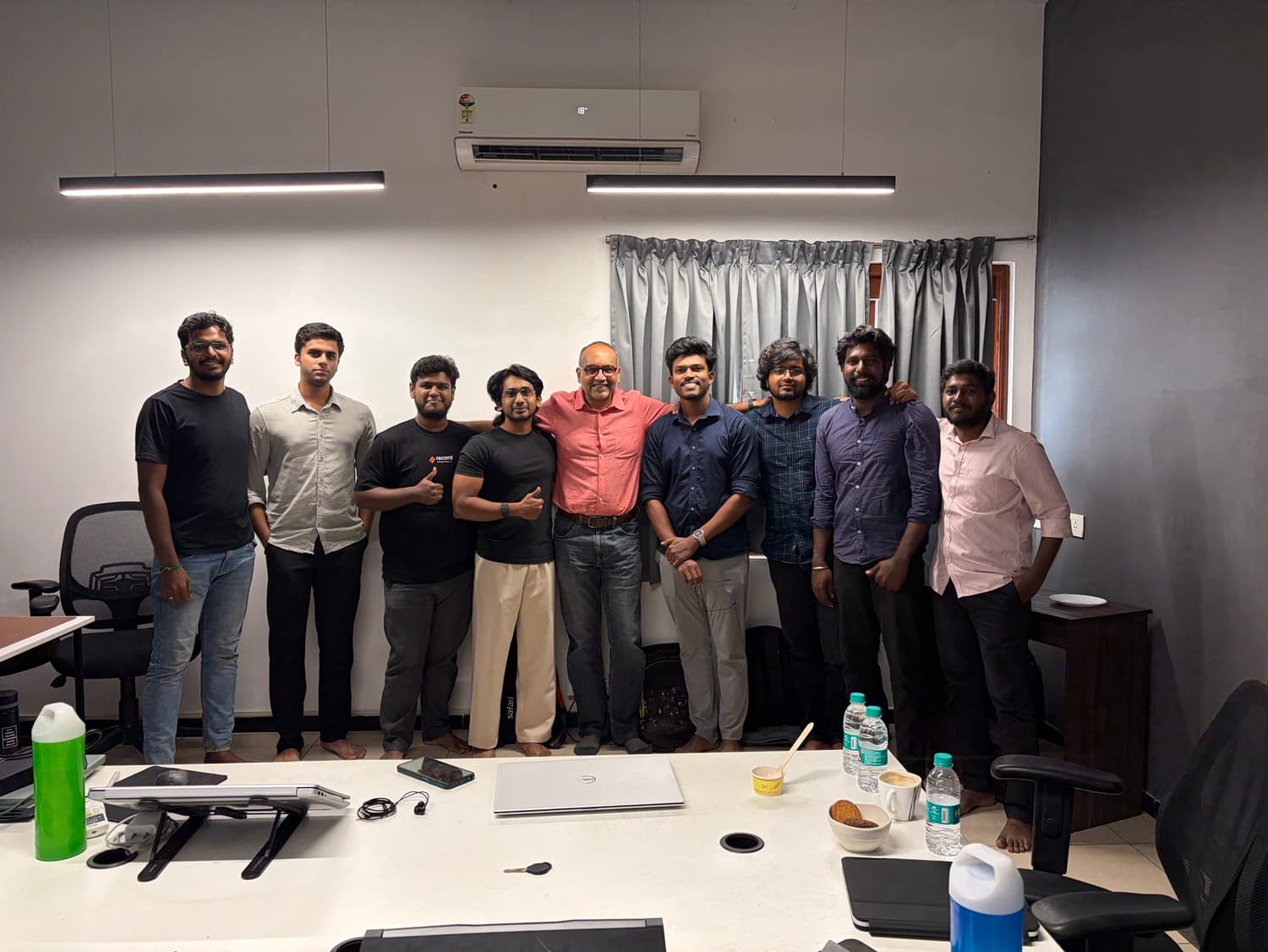 Team selfie at an office celebration